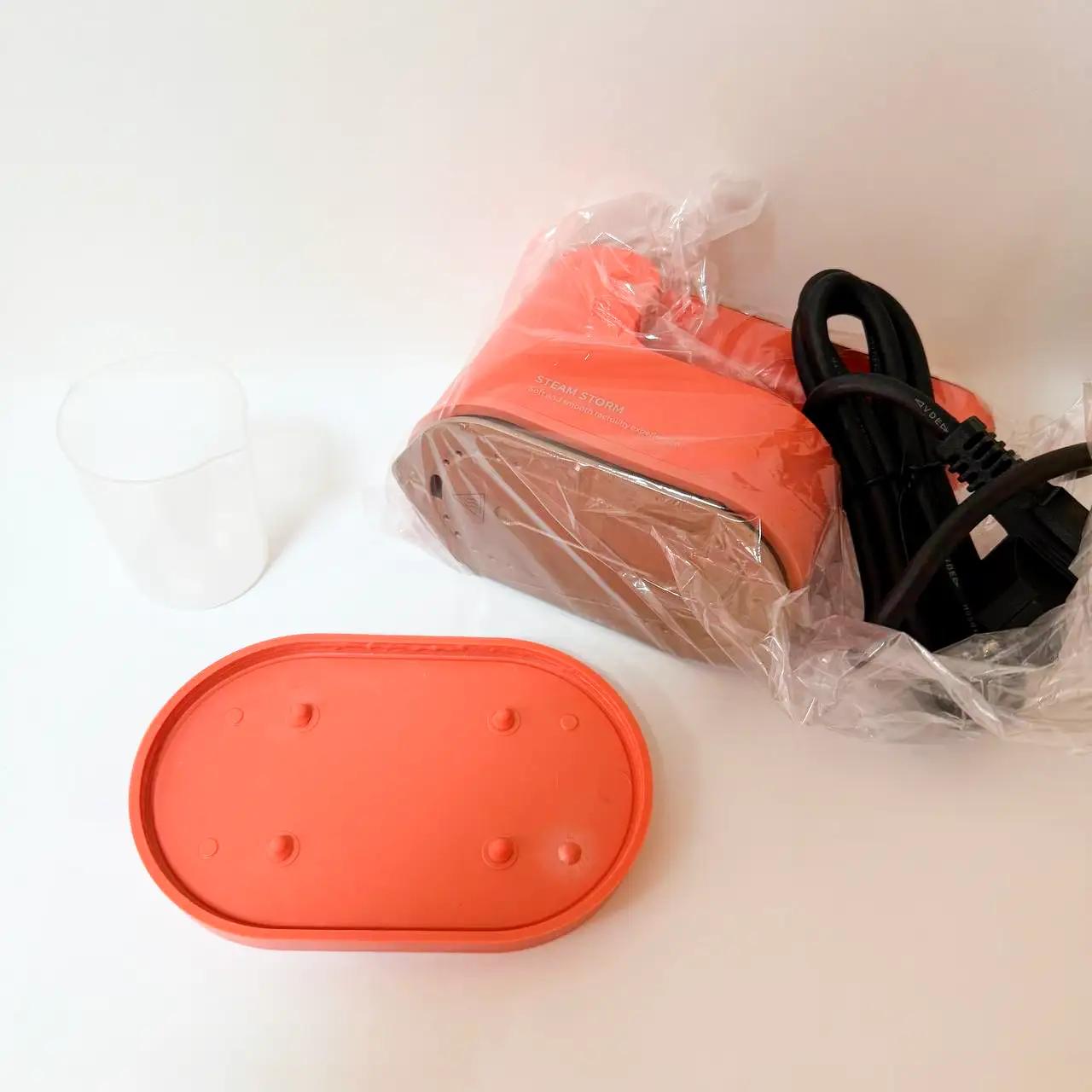 Праска-відпарювач дорожня “Warm Travel” 1200 W, помаранчева, Декор - Фото 2 Праска-відпарювач дорожня “Warm Travel” 1200 W, помаранчева, Декор - Фото 2