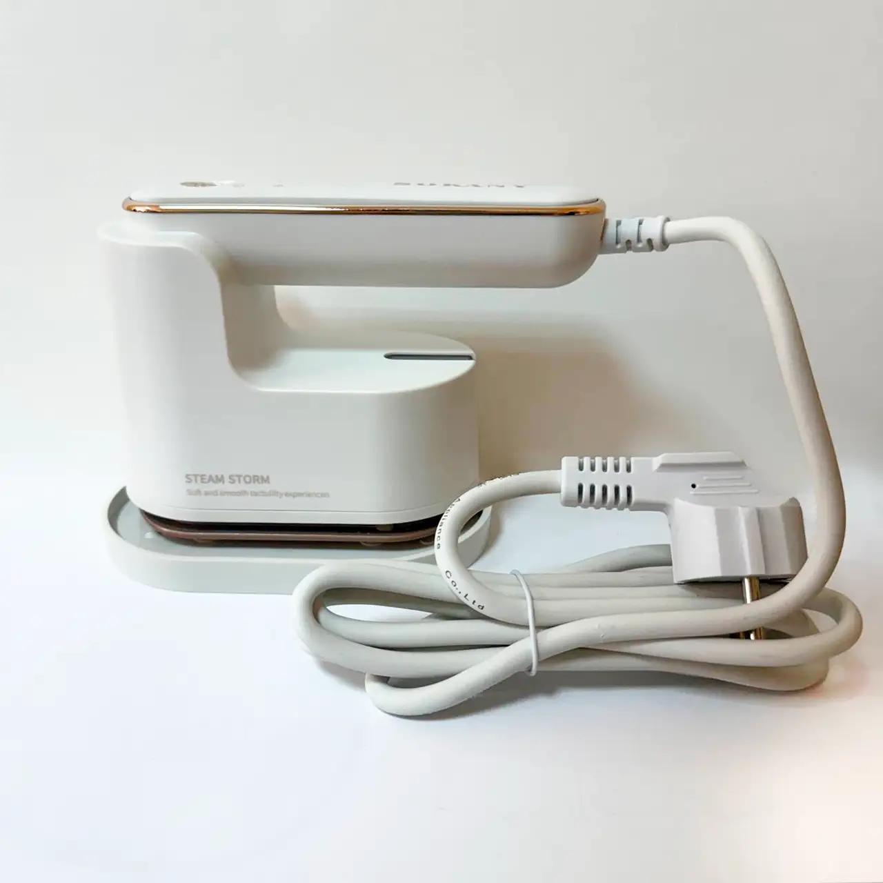 Праска-відпарювач дорожня “Warm Travel” 1200 W, біла Праска-відпарювач дорожня “Warm Travel” 1200 W, біла